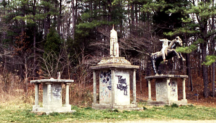 ET_Wickham_roadside_park_and_Wickham_Cemetery_three_broken_statues
